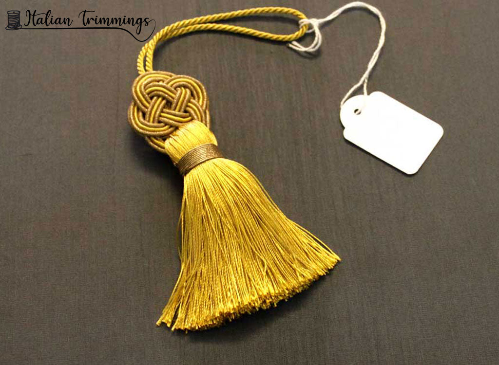 Key tassels. Laminated ancient gold. Made in Italy